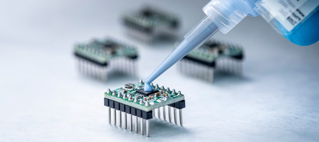 Photo of Appli-Thane® 7300 adhesive being used for bonding a heat sink that required maximum thermal conductivity — one of many applications for this versatile material.